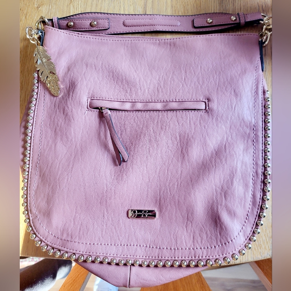 Jessica Simpson Pink Shoulder bag trimmed in gold.